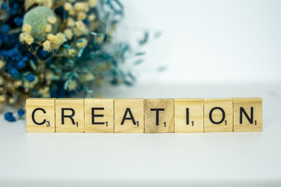 Letter tiles spelling the word creation
